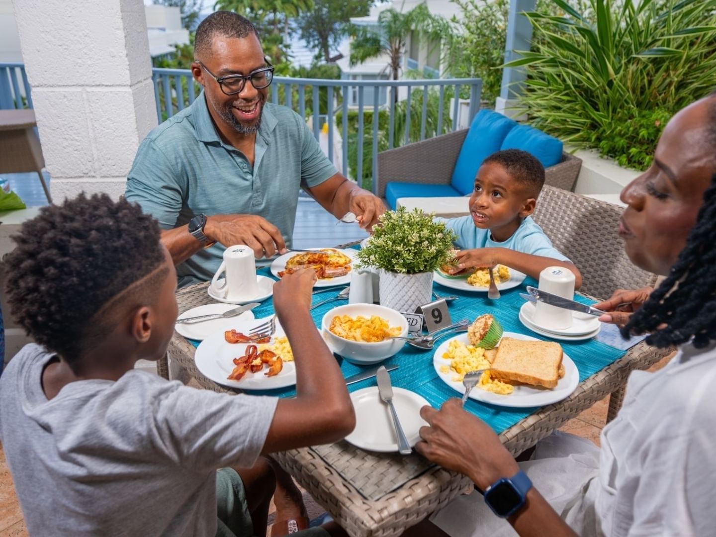 Family enjoying a breakfast meal at the Savannah Beach Hotel.