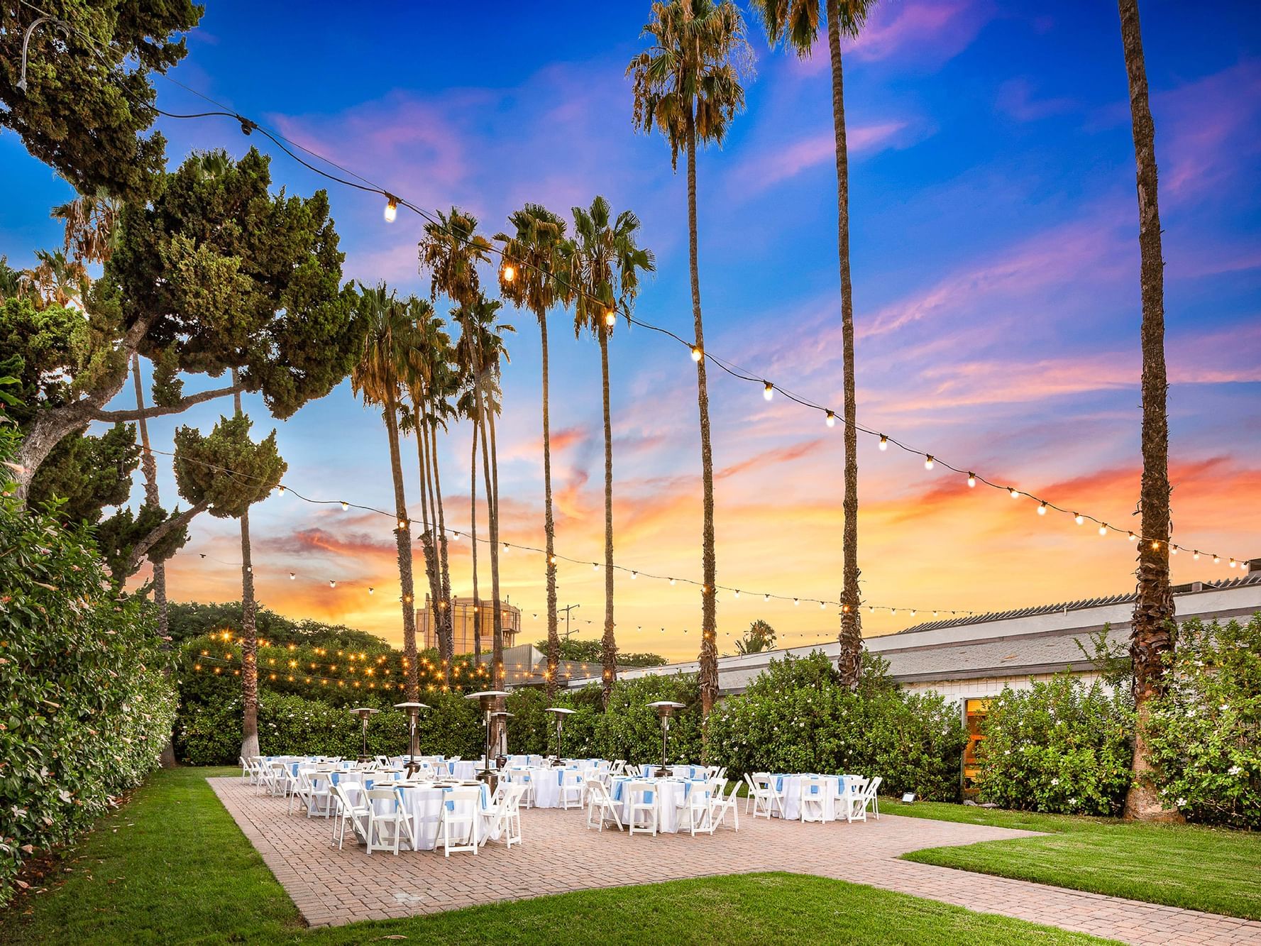 Veranda with table set up for outdoor event, The Anaheim Hotel
