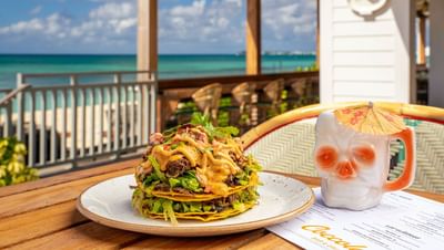 Beachside feast of beef tacos, crisp lettuce, and zesty sauce served in Coccoloba Bar & Grill at The Residences at Seafire