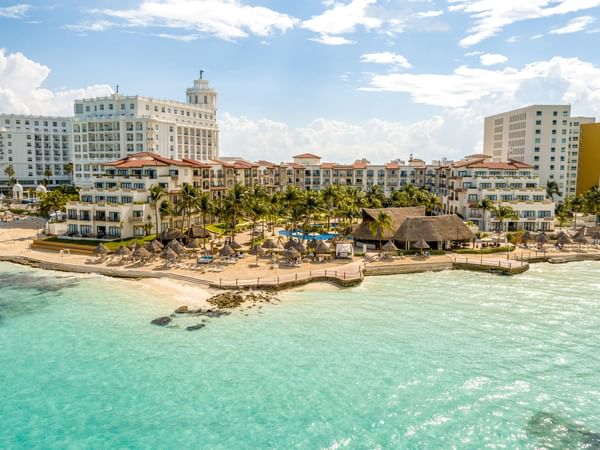Distant view of Fiesta Americana with coastline, La Colección
