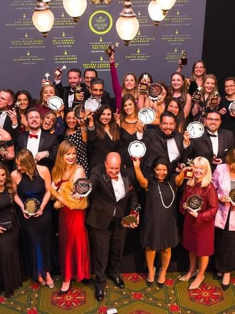 Palazzo Versace Dubai team posing with trophies in 2019