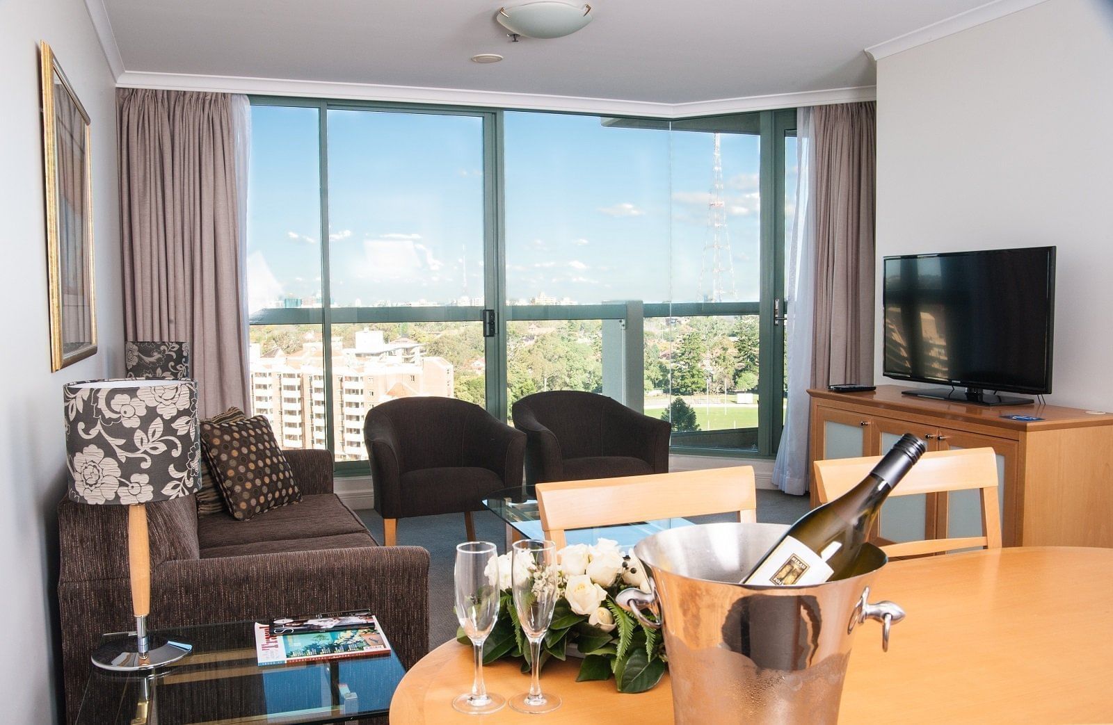 Comfortable sitting area with out door view at the Sebel Residence Chatswood