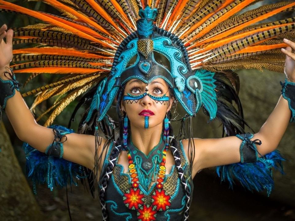 Woman performs Aztec culture near Dominion Suites Polanco