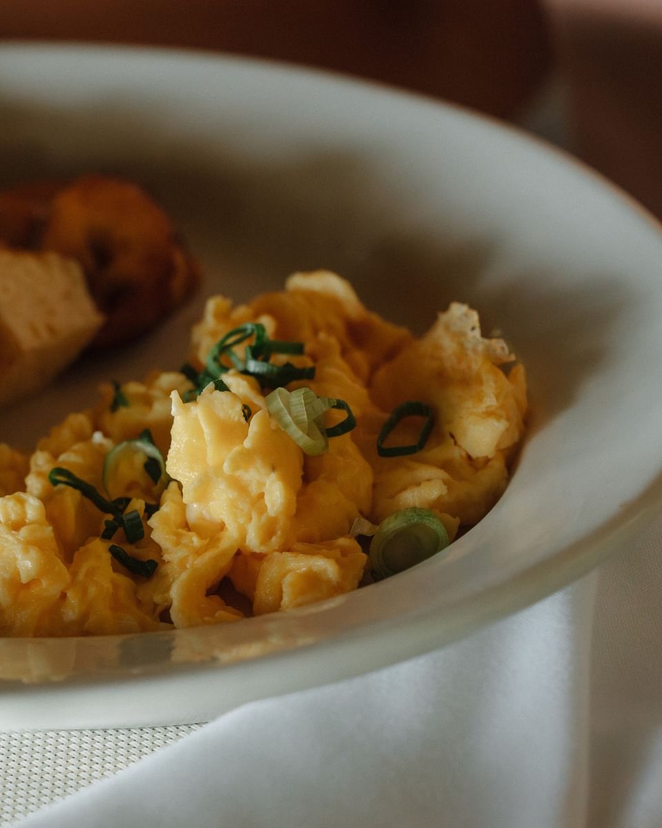 Fluffy scrambled eggs with scallions in La Bastide Restaurant, one of the San Juan del Sur restaurants at Morgan’s Rock