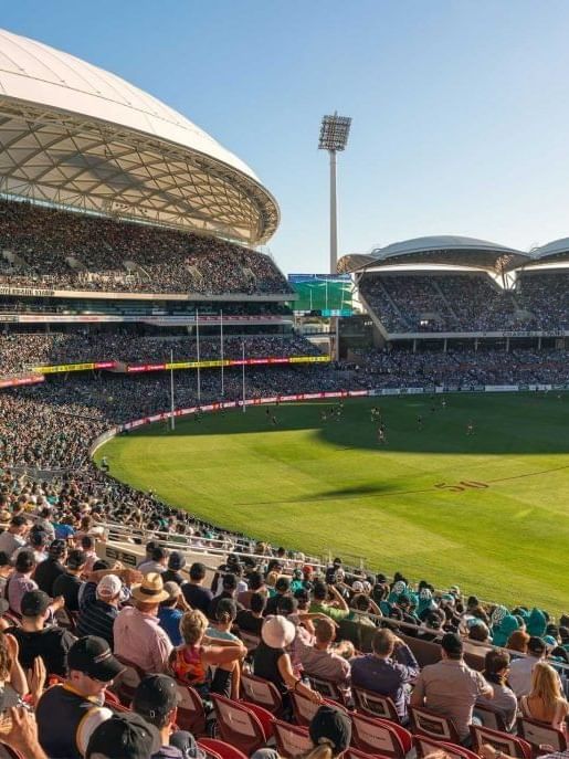 Crowded sports stadium near ibis Sydney World Square Hotel
