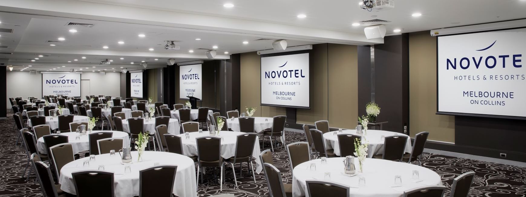 Banquet table setup in meeting room at Novotel Melbourne