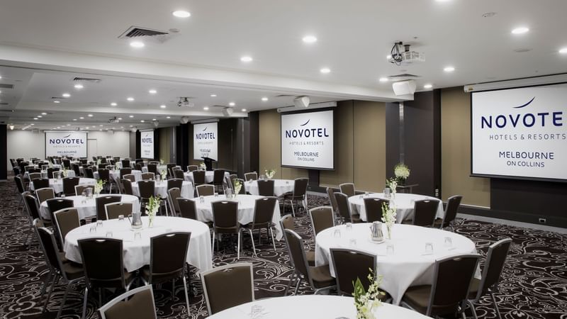 Banquet table setup in meeting room at Novotel Melbourne
