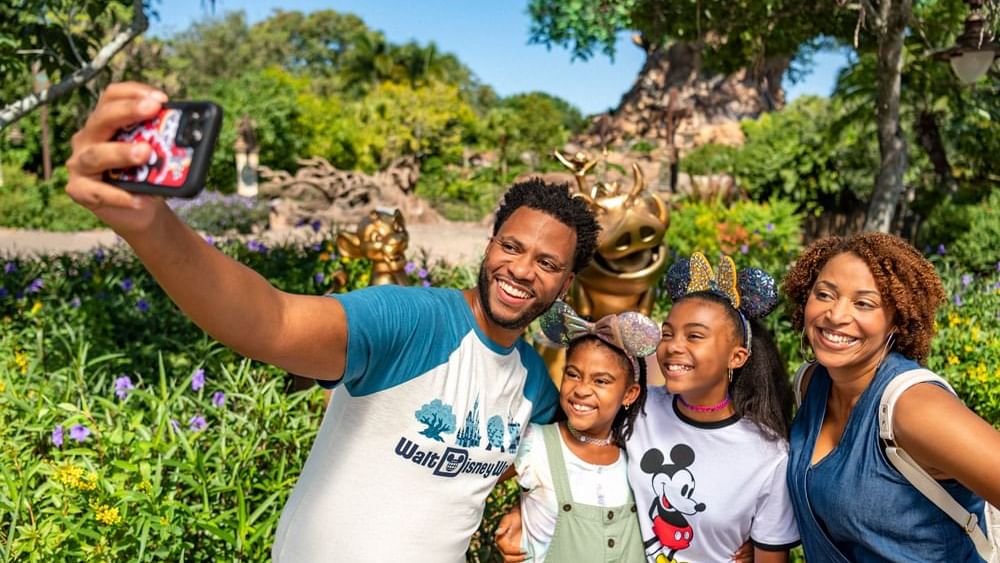 Family taking selfie in Disney’s Animal Kingdom Theme Park near Lake Buena Vista Resort Village & Spa