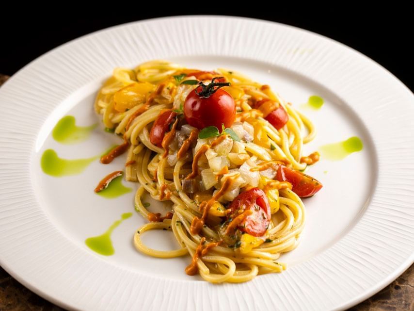 Close-up of a served seafood spaghetti plate at EMME Restaurant