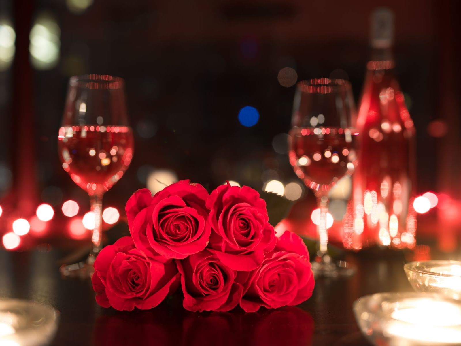Close-up of red roses, candles & wine, The Herrington Inn & Spa