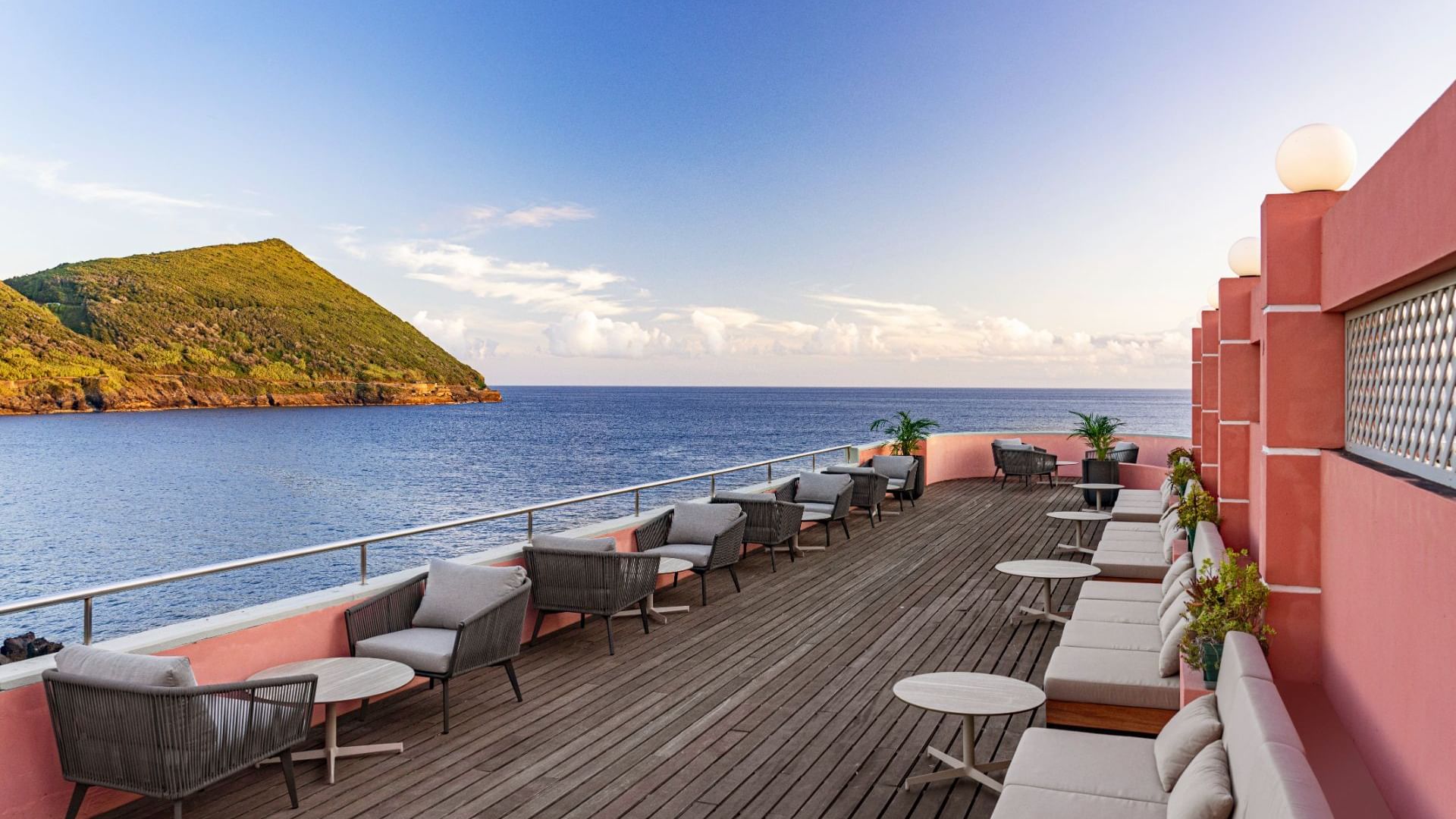 Dining area on a terrace with sea view in Monte Brasil at Terceira Mar Hotel