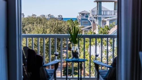 Premium Resort suite with balcony area and two lounges at Watersound Inn