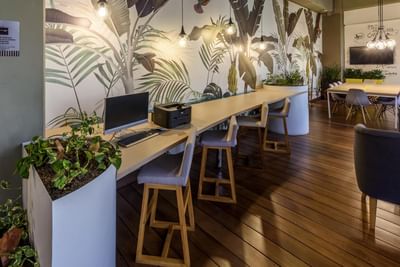 An office aera with wooden floor at Diez Hotel Categoría