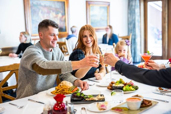 Family having their meal at Stein Eriksen Lodge