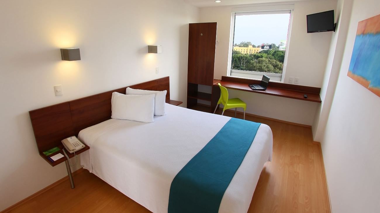 Bed in Superior Queen Room at One Xalapa Las Ánimas