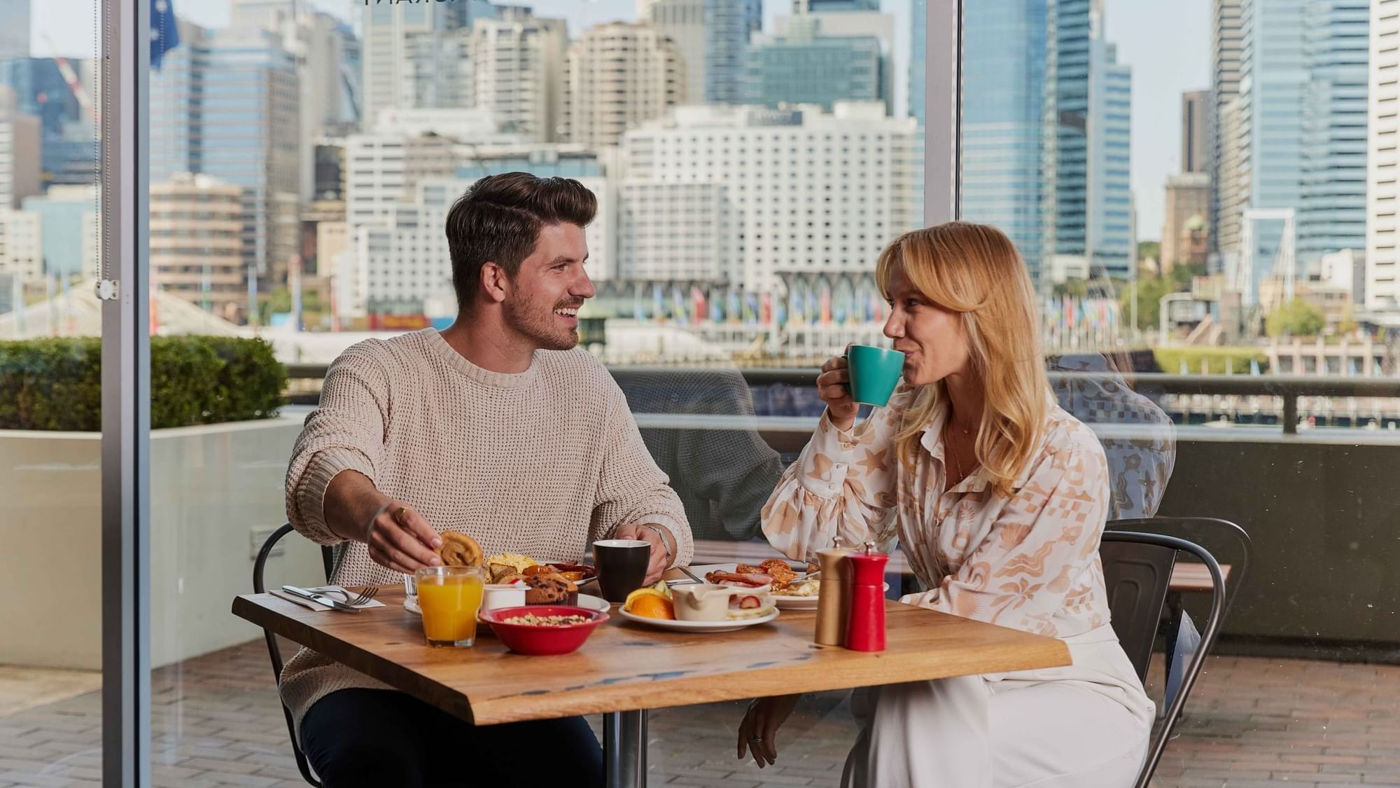 Couple eating breakfast at ibis restaurant