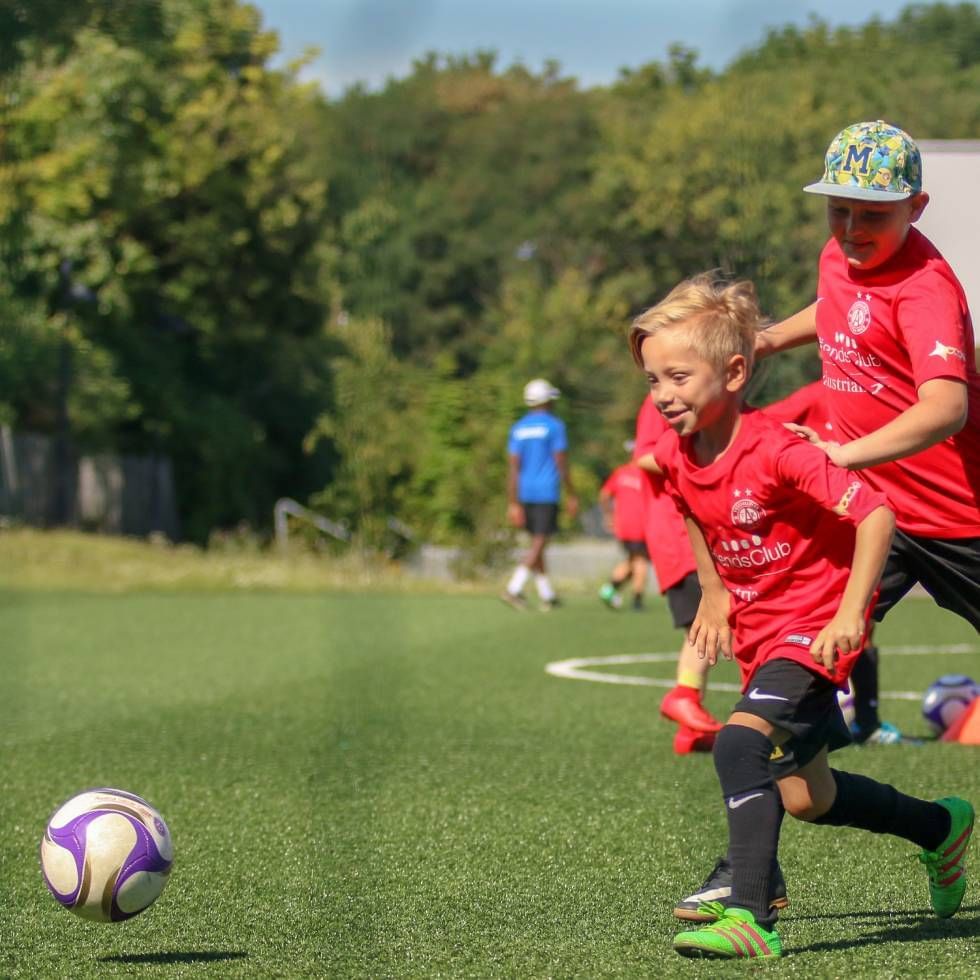 Kids playing football at Falkensteiner Hotels & Residences