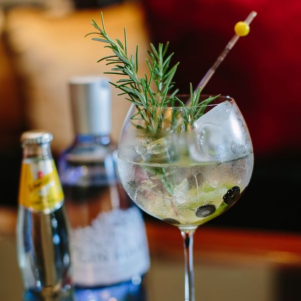 Rosemary & olive Cocktail served at Falkensteiner Schlosshotel Velden