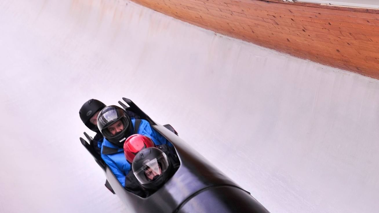 Bobsled riders in Utah Olympic Park near Chateaux Deer Valley