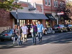 Friends walking together on the Street near Boothill Inn & Suites