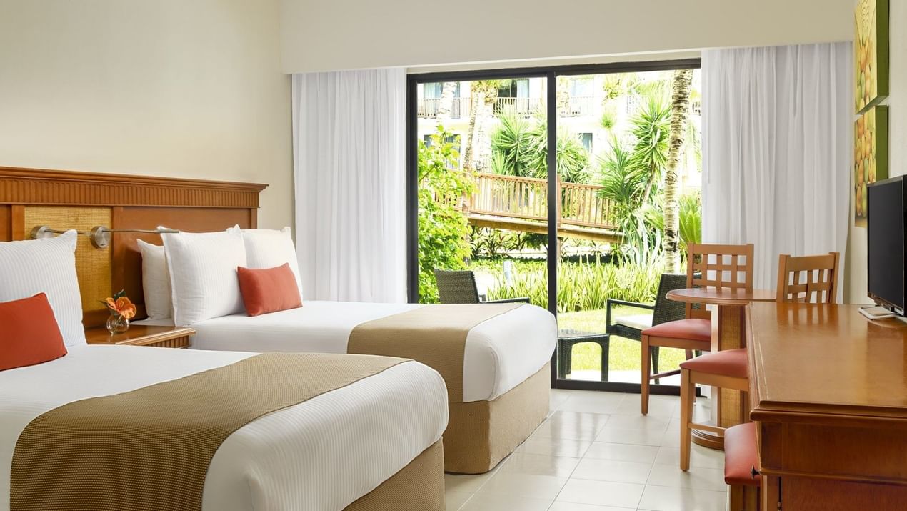 Superior Garden View Room with two beds at The Reef Coco Beach