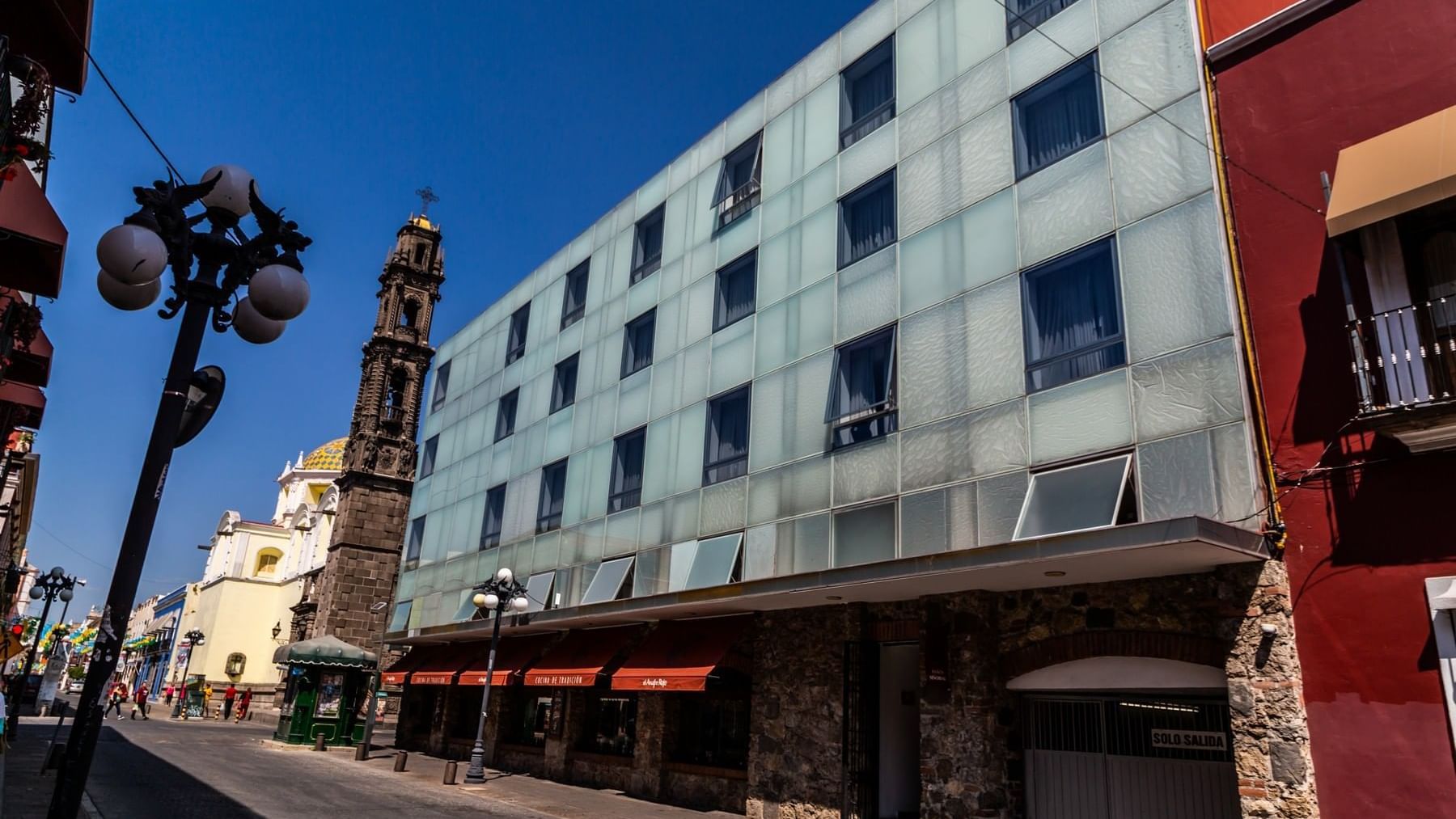 Exterior view of Gamma Puebla Señorial Centro, street with lamps & view of the Cathedral