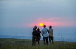Tourists at Sundowners on The Crater Rim near Ngorongoro Serena