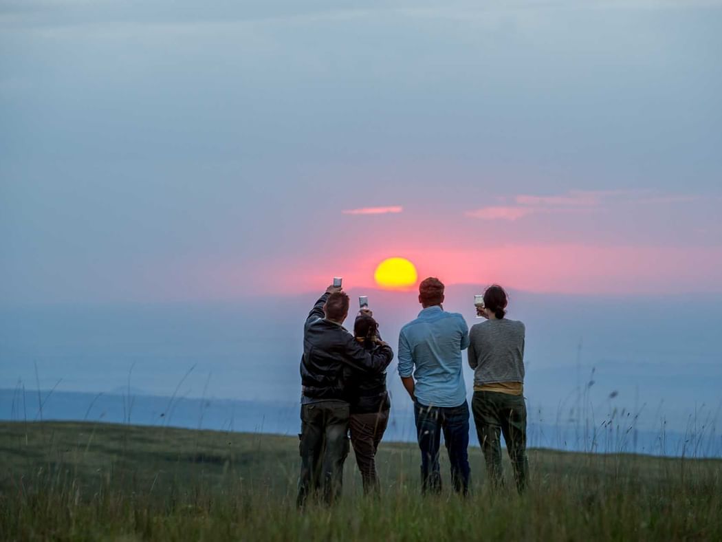 Tourists at Sundowners on The Crater Rim near Ngorongoro Serena
