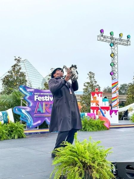 A musician performing at the EPCOT International Festival of the Arts.