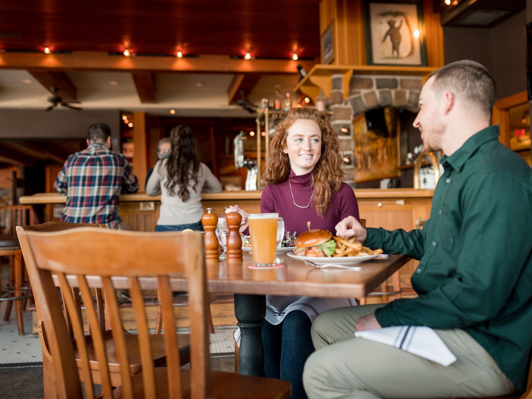 Couple having lunch in Dancing Bears restaurant at High Peaks Resort