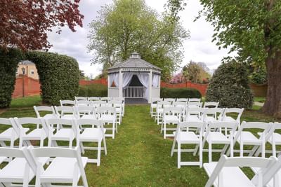 Chairs in front of a Gazebo for a wedding at Orsett Hall Hotel
