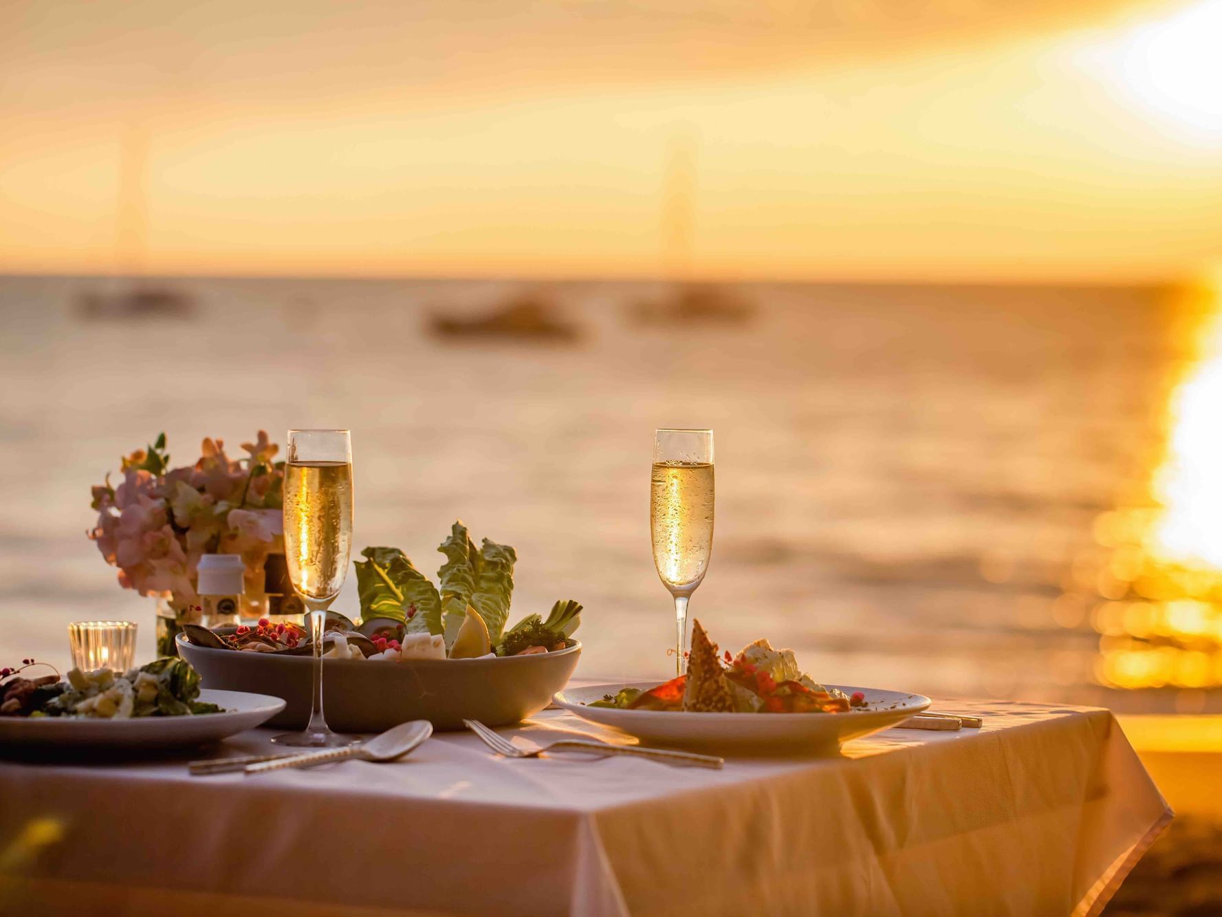 Champagne & fine dishes overlooking the sea during sunset at Danna Langkawi Hotel