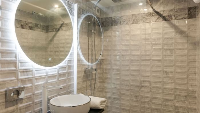 Bathroom vanity in bedrooms at Hotel Rennes South Chantepie