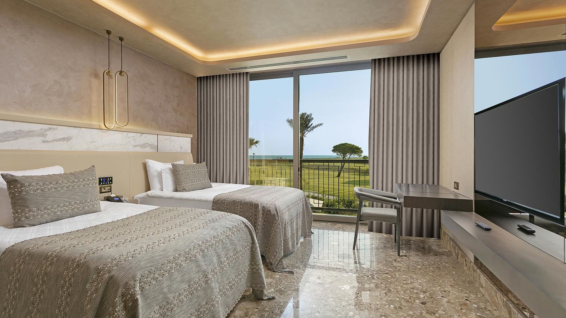 TV & work desk facing the beds in Cullinan Villa at Cullinan Belek