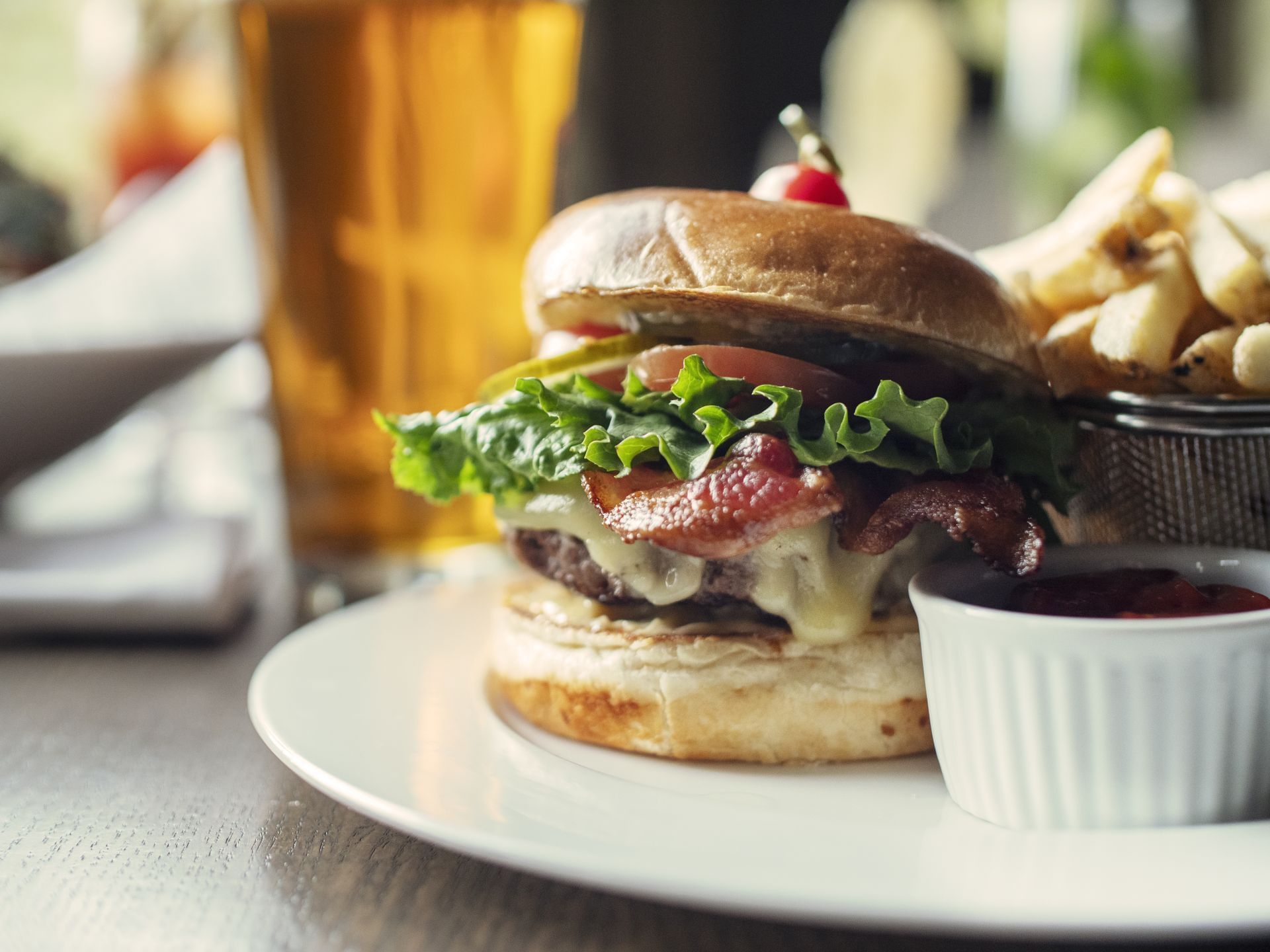 Closeup of a beef cheeseburger served at The Malcolm Hotel