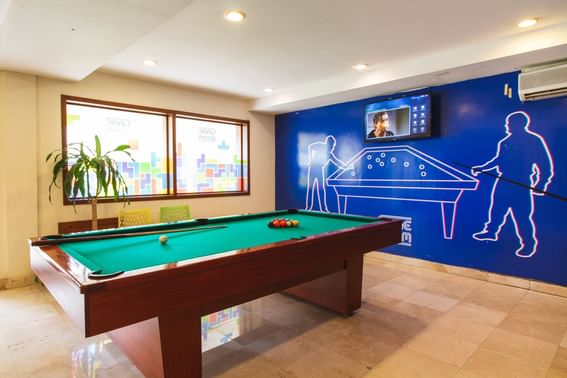 Game Area with a pool table at Plaza Pelicanos Grand Beach Resort