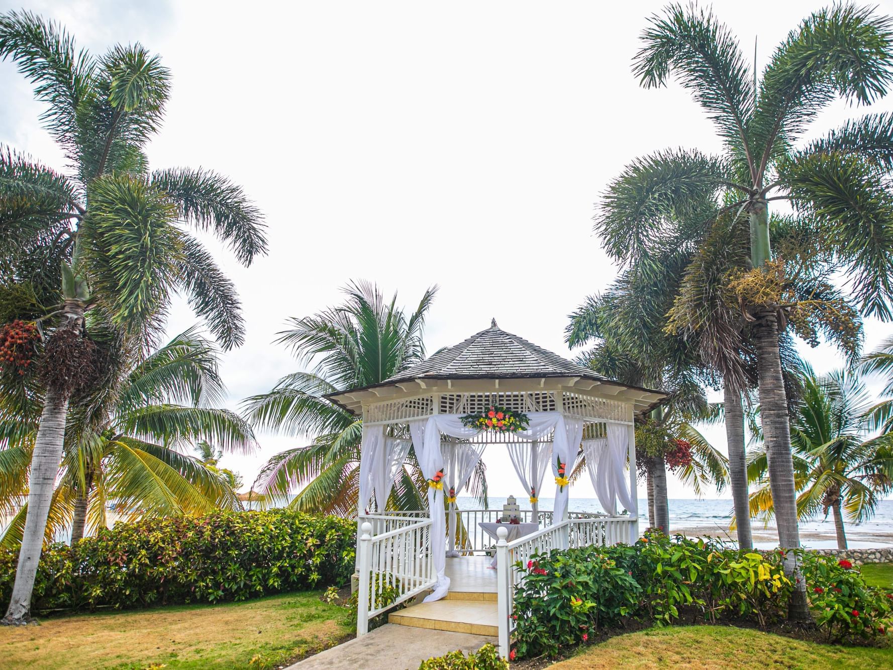 Cake & decorations in the Cupid Gazebo overlooking the sea at Holiday Inn Montego Bay