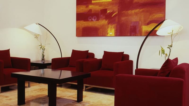 Bedroom featuring Two cozy beds with a green striped wallpaper at Fiesta Americana Travelty