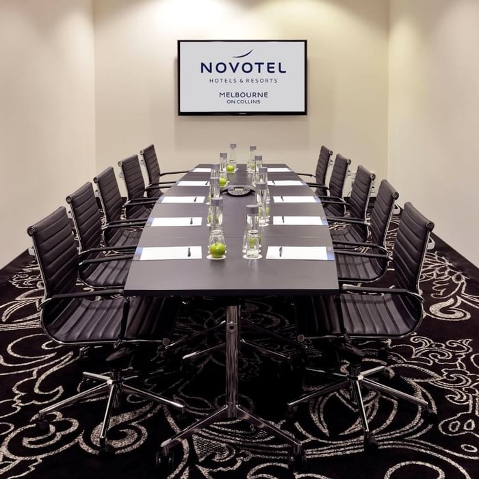 Conference table setup for meeting at Novotel Melbourne