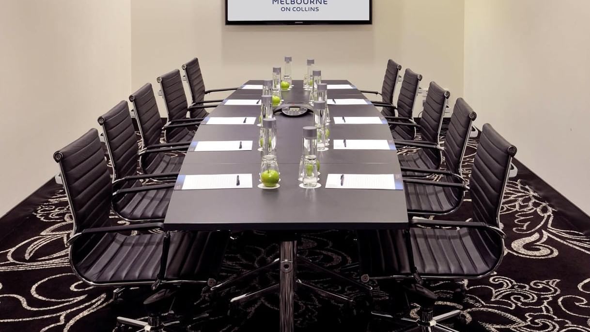 Conference table setup for meeting at Novotel Melbourne