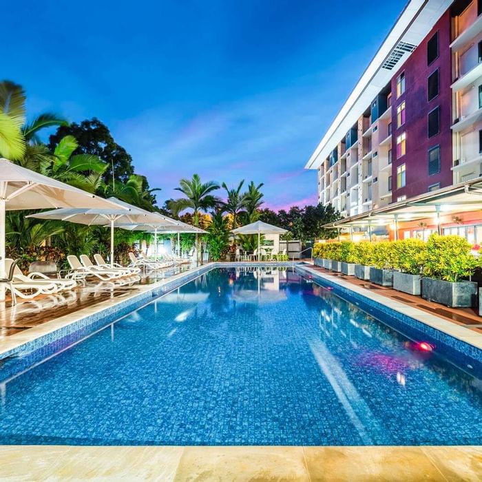 Exterior of the pool with pool beds at Darwin Airport Hotels
