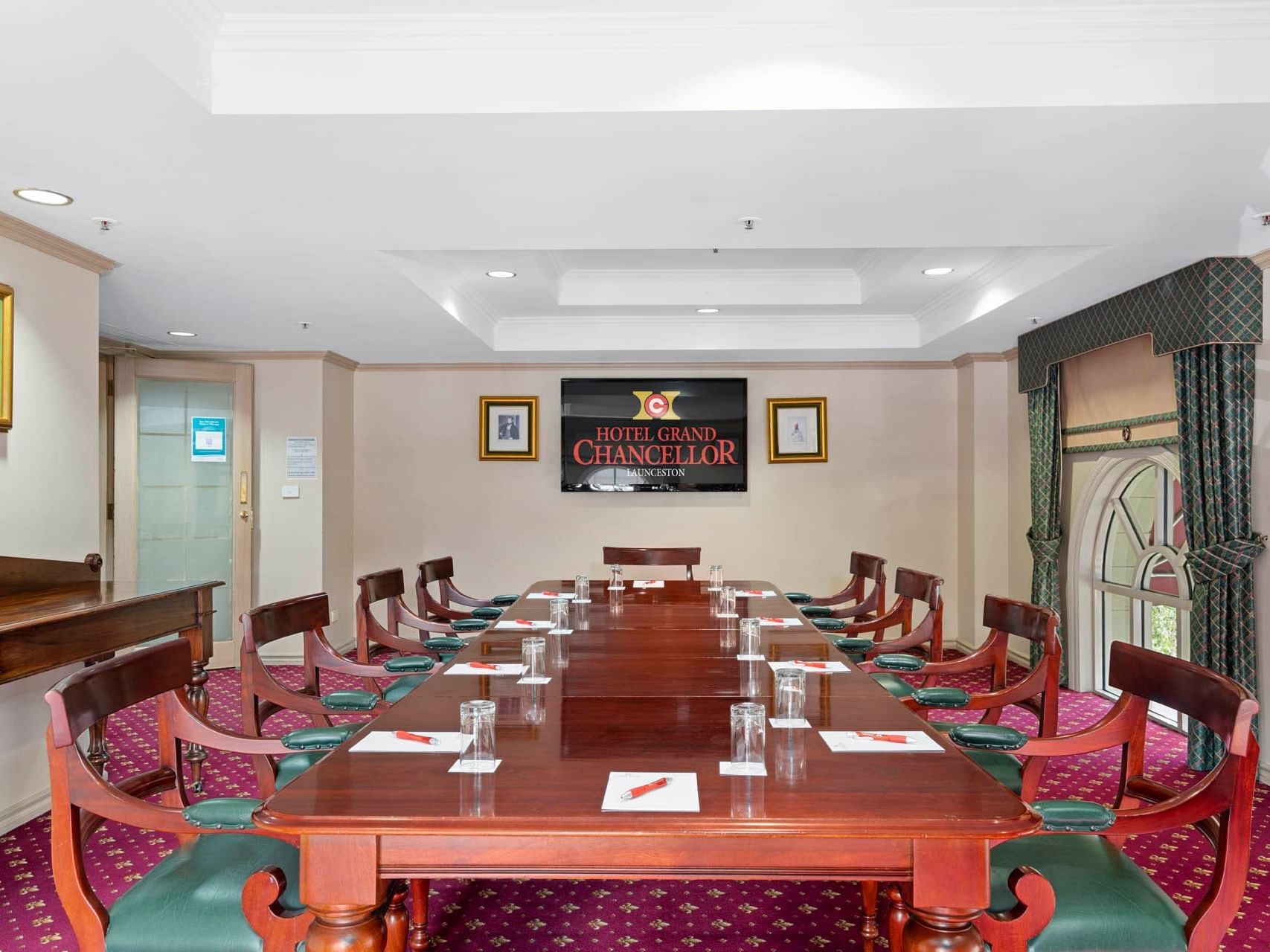 Conference set-up on the red matted floor in Chancellor 7 at Hotel Grand Chancellor Launceston