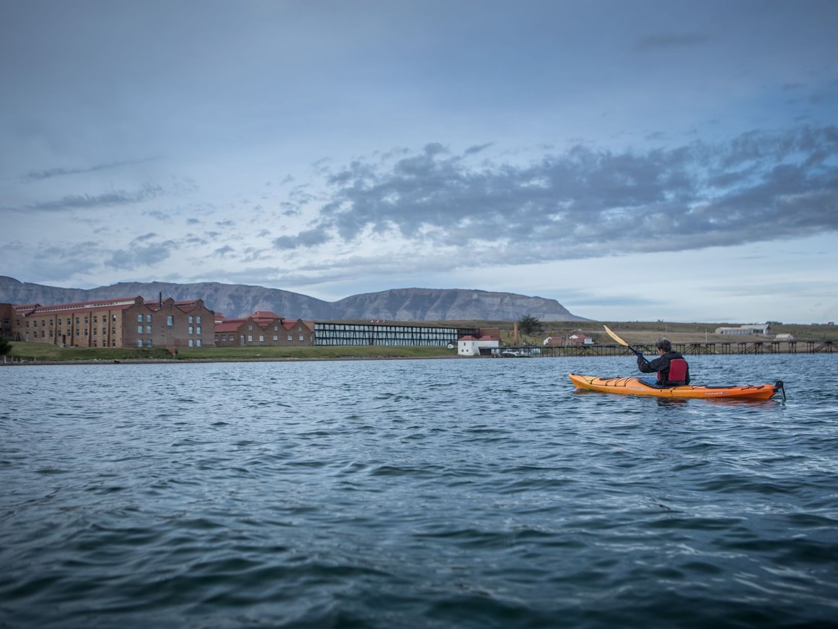 A man kayaking at the sea near The Singular Patagonia