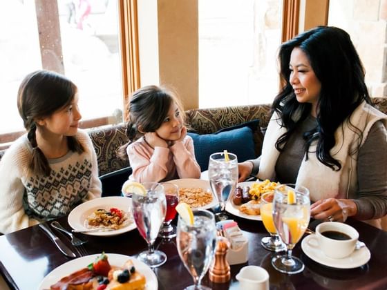 Family dining in Cena Ristorante at Chateaux Deer Valley