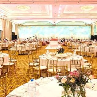 Banquet tables arranged in Grand ballroom at Ajman Hotel