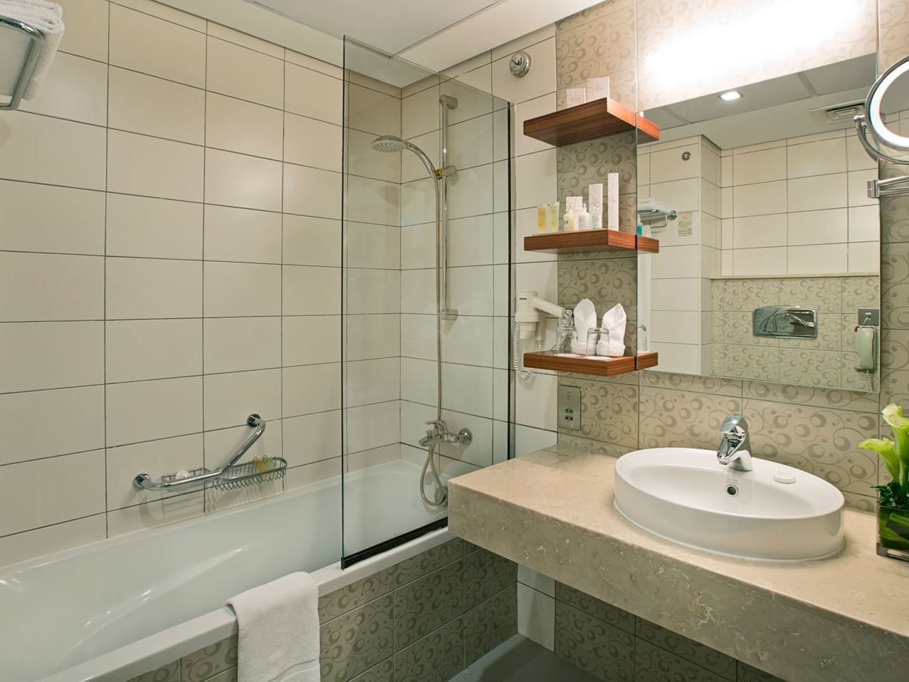 Vanity & bathtub in Premium Room at City Seasons Hotels