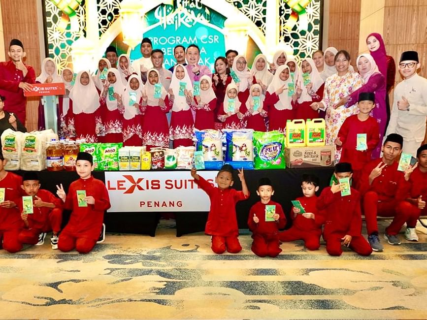 Children posing for the photo at Lexis Suites Penang - Lexis Hotels & Resorts