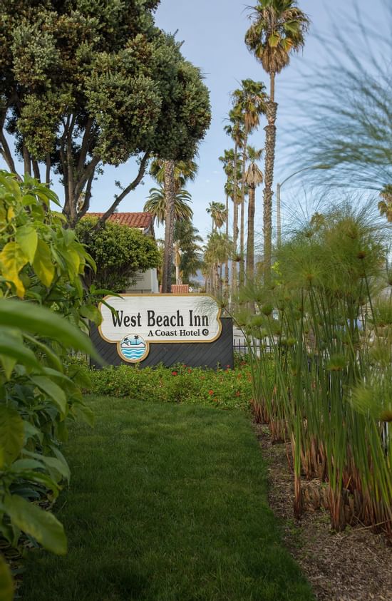 Sign for West Beach Inn, a Coast Hotel