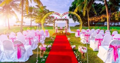 An outdoor area arranged for a wedding ceremony