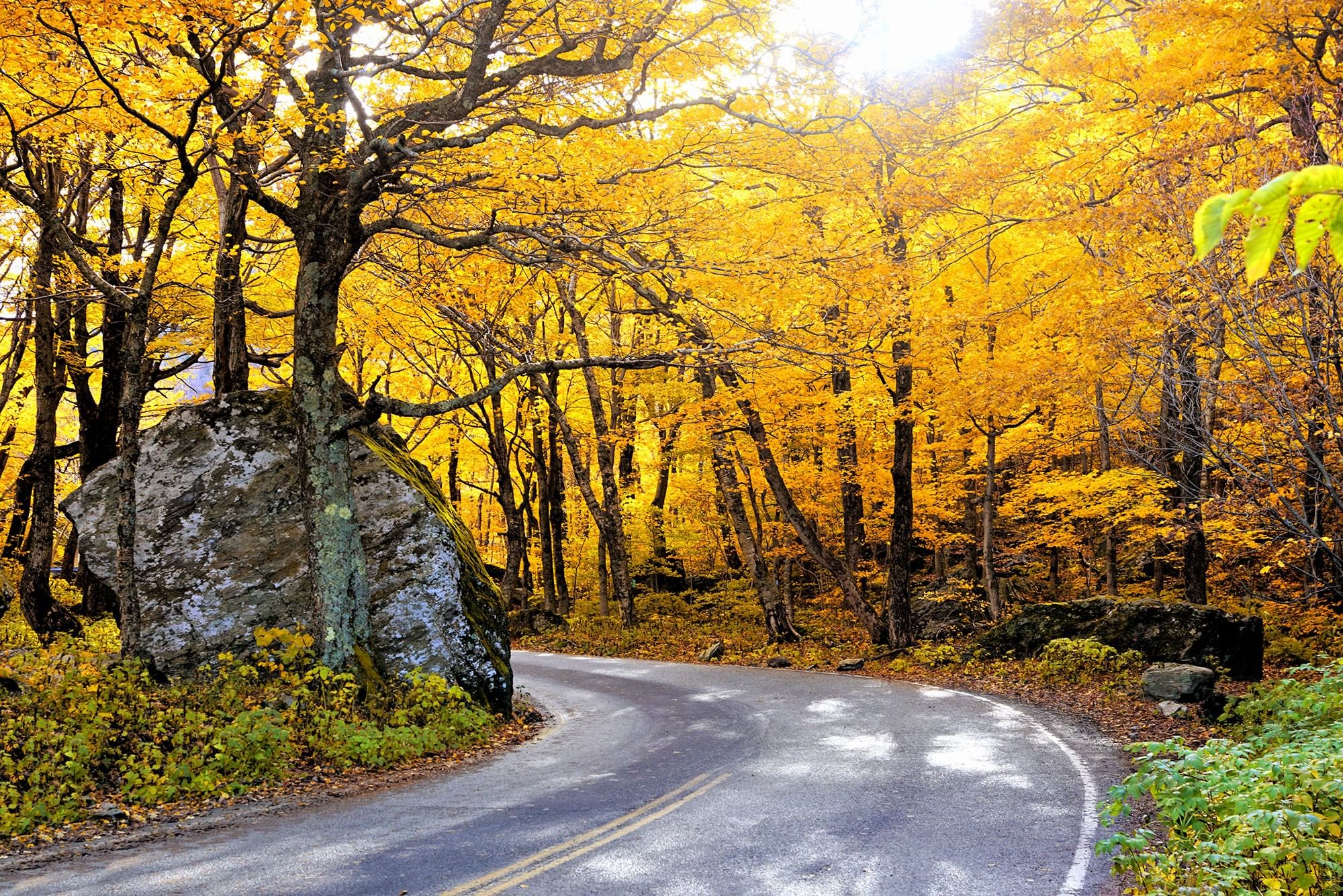 Vermont scenic drives through Smugglers’ Notch in fall.